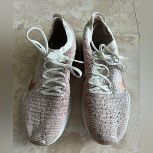 Nike gold flyknit sneakers